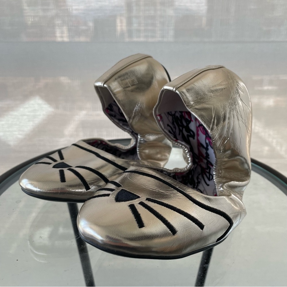 Karl Lagerfeld metallic light gold cat design stretch ballet flats.  Size 7M
